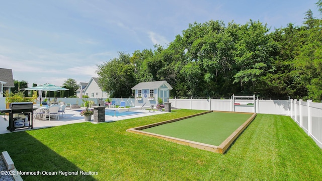 24 Woodview Ln, Cape May Court House, NJ 08210 - surrounding community featuring a bocce ball area, an outdoor structure, a patio, and a pool