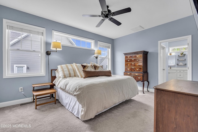 24 Woodview Ln, Cape May Court House, NJ 08210 - bedroom with light colored carpet, baseboards, ceiling fan, and connected bathroom