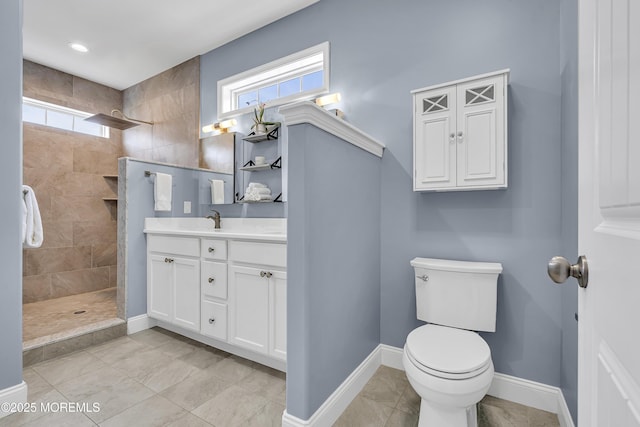 24 Woodview Ln, Cape May Court House, NJ 08210 - bathroom featuring vanity, a tile shower, toilet, and baseboards