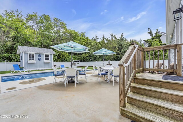 24 Woodview Ln, Cape May Court House, NJ 08210 - fenced backyard with outdoor dining space, a patio area, and view of scattered trees