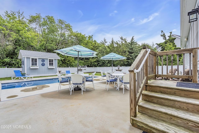 24 Woodview Ln, Cape May Court House, NJ 08210 - fenced backyard featuring outdoor dining space, a patio, and view of scattered trees