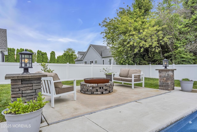 24 Woodview Ln, Cape May Court House, NJ 08210 - fenced backyard featuring a patio area and an outdoor living space with a fire pit