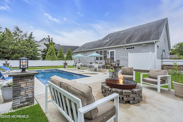 24 Woodview Ln, Cape May Court House, NJ 08210 - view of swimming pool featuring a fire pit, a patio area, and a fenced backyard