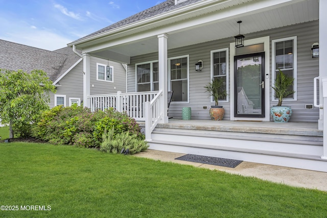 24 Woodview Ln, Cape May Court House, NJ 08210 - property entrance featuring covered porch, a yard, and a shingled roof