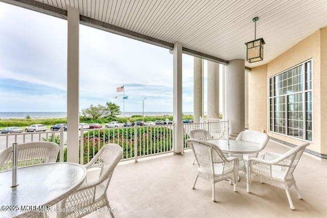 700 Ocean Ave Unit 514, Spring Lake, NJ 07762 - sunroom / solarium featuring outdoor dining space, floor to ceiling windows, and a water view