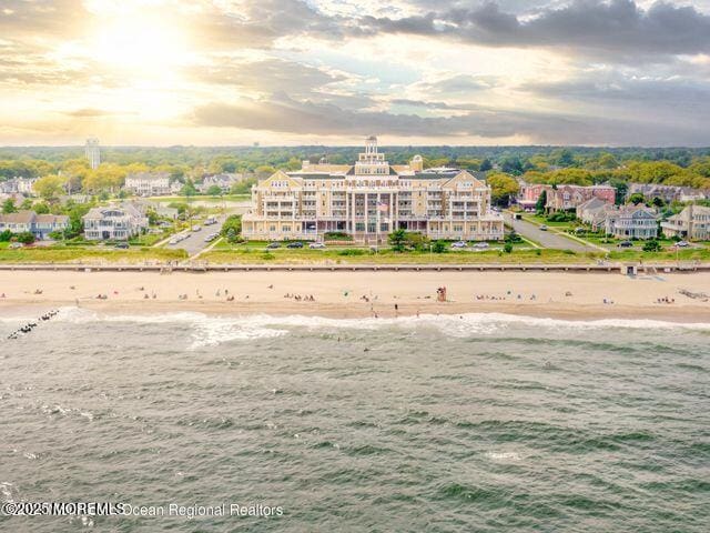 700 Ocean Ave Unit 514, Spring Lake, NJ 07762 - drone / aerial view of waterfront with a beach