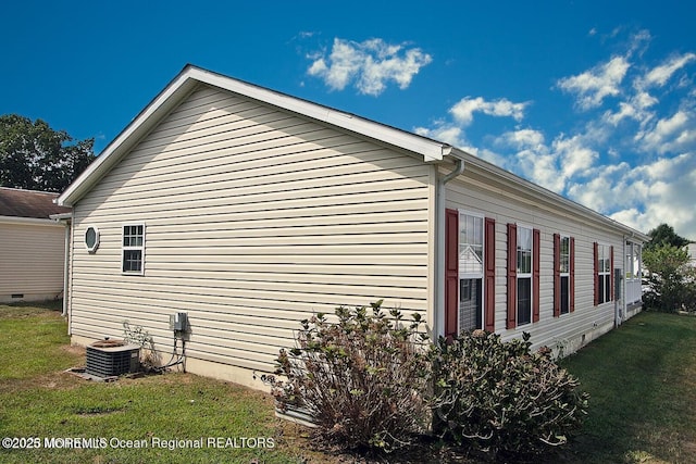 9 Pine Grove Ave, Manahawkin, NJ 08050 - view of home's exterior with a lawn, central AC, and crawl space