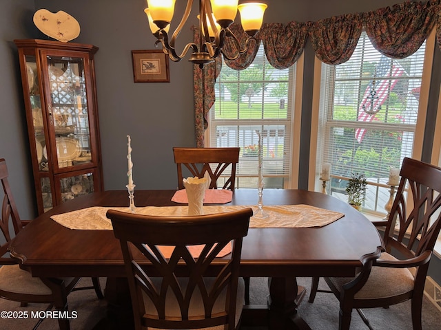 9 Pine Grove Ave, Manahawkin, NJ 08050 - dining space with a chandelier and plenty of natural light