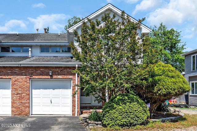 14 Emerald Dr Unit B, Barnegat, NJ 08005 - view of front of home with brick siding, a garage, and a shingled roof