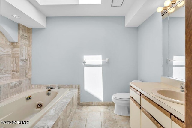 14 Emerald Dr Unit B, Barnegat, NJ 08005 - bathroom with a tub with jets, toilet, vanity, and tile patterned floors