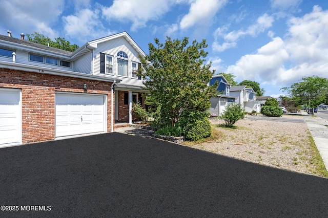 14 Emerald Dr Unit B, Barnegat, NJ 08005 - view of front of house with brick siding and driveway