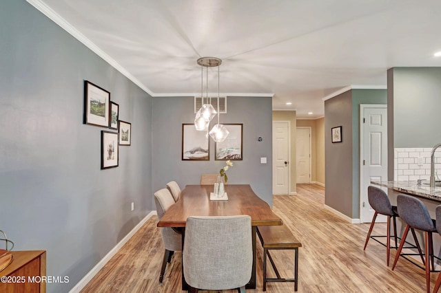 22 Commons Dr, Neptune Township, NJ 07753 - dining area with light wood finished floors, baseboards, crown molding, and recessed lighting