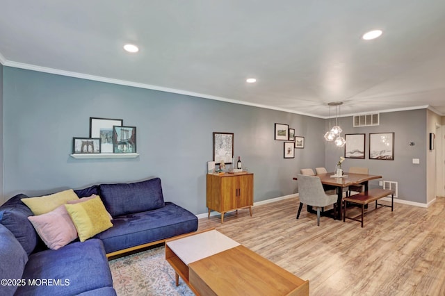 22 Commons Dr, Neptune Township, NJ 07753 - living area with recessed lighting, ornamental molding, baseboards, and light wood-style flooring