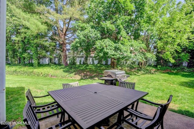 22 Commons Dr, Neptune Township, NJ 07753 - view of patio featuring outdoor dining space, grilling area, and view of wooded area