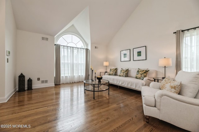 30 Thousand Oaks Ter, Howell, NJ 07731 - living room featuring wood finished floors, baseboards, and high vaulted ceiling