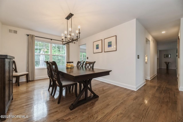 30 Thousand Oaks Ter, Howell, NJ 07731 - dining space featuring wood finished floors, a chandelier, baseboards, and recessed lighting