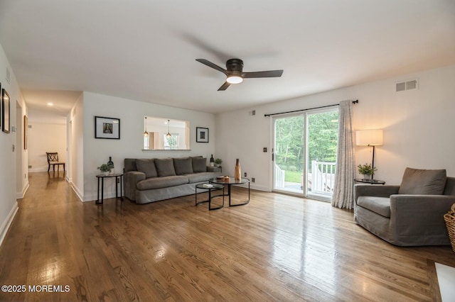 30 Thousand Oaks Ter, Howell, NJ 07731 - living area with wood finished floors, a ceiling fan, and baseboards