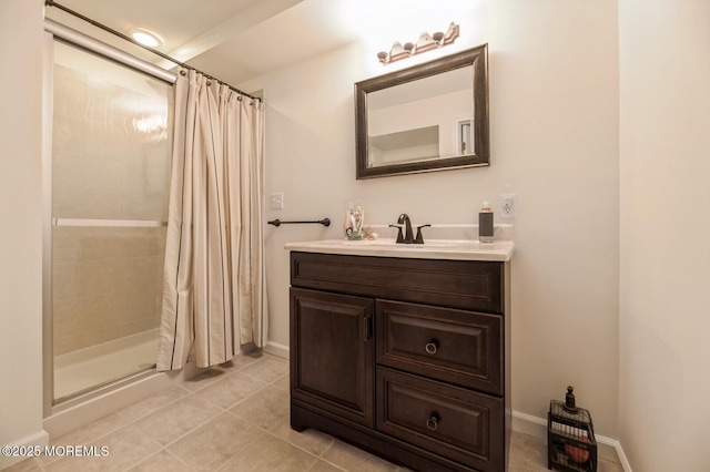 30 Thousand Oaks Ter, Howell, NJ 07731 - full bath with a tile shower, vanity, tile patterned floors, and baseboards