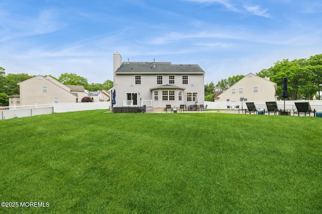 30 Thousand Oaks Ter, Howell, NJ 07731 - back of property with a patio area and a chimney