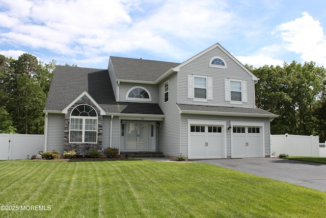 30 Thousand Oaks Ter, Howell, NJ 07731 - view of front of house with driveway, a garage, a shingled roof, a gate, and stone siding