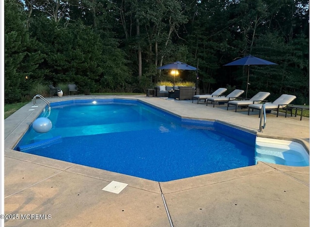 30 Thousand Oaks Ter, Howell, NJ 07731 - outdoor pool with a patio and outdoor lounge area