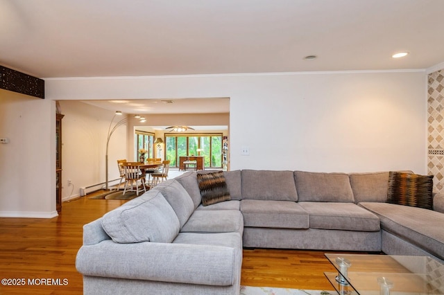 668 Clifton Ave, Toms River, NJ 08753 - living area featuring crown molding, wood finished floors, a baseboard radiator, recessed lighting, and baseboards