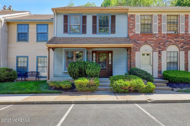 48 Scarborough Ct Unit 7, Freehold, NJ 07728 - multi unit property featuring uncovered parking and brick siding