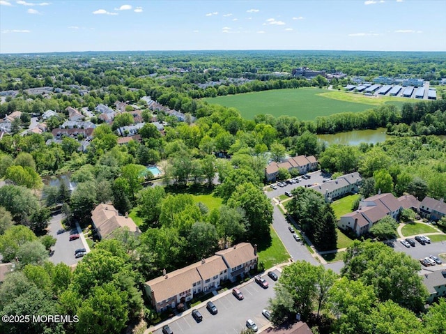 48 Scarborough Ct Unit 7, Freehold, NJ 07728 - aerial perspective of suburban area featuring a large body of water
