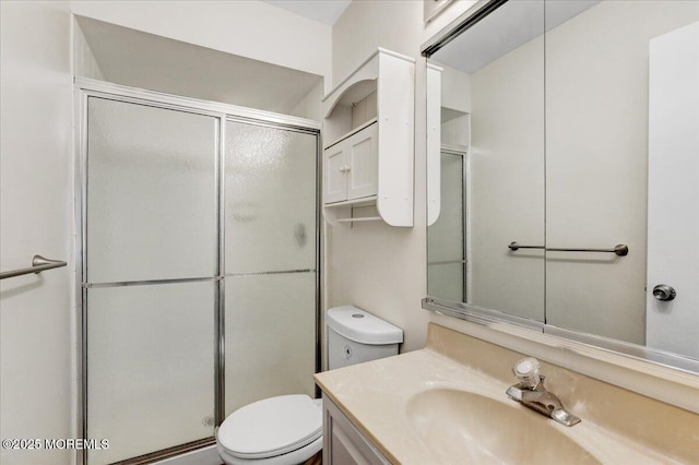 48 Scarborough Ct Unit 7, Freehold, NJ 07728 - full bathroom with toilet, a stall shower, and vanity