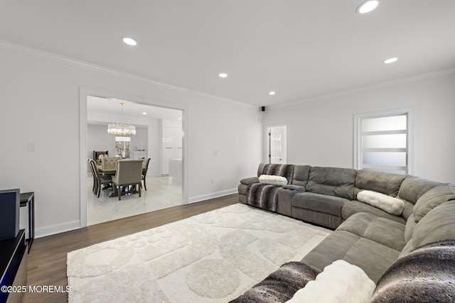 11 Clay St, West Long Branch, NJ 07764 - living room featuring recessed lighting, wood finished floors, ornamental molding, a chandelier, and baseboards