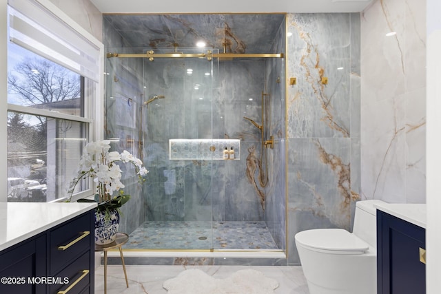 11 Clay St, West Long Branch, NJ 07764 - bathroom with vanity, marble tiled floors, tile walls, toilet, and a marble finish shower