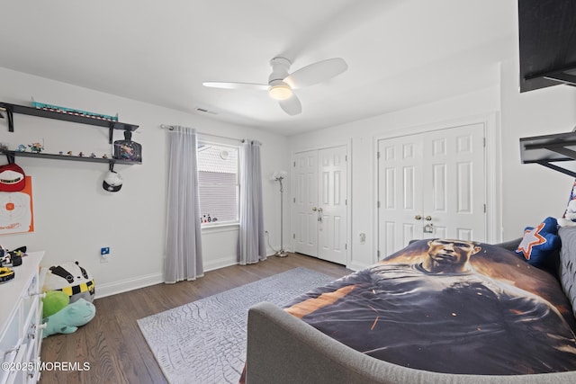 11 Clay St, West Long Branch, NJ 07764 - bedroom with multiple closets, wood finished floors, baseboards, and a ceiling fan
