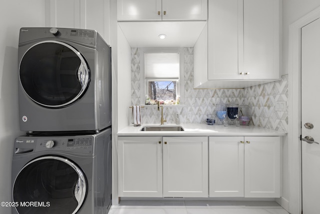 11 Clay St, West Long Branch, NJ 07764 - washroom with stacked washing machine and dryer and cabinet space