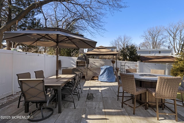 11 Clay St, West Long Branch, NJ 07764 - fenced backyard featuring outdoor dining space and a patio area