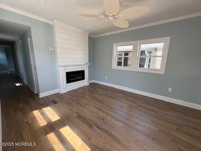 13 John St, Hazlet, NJ 07730 - unfurnished living room featuring dark wood finished floors, ornamental molding, baseboards, and ceiling fan