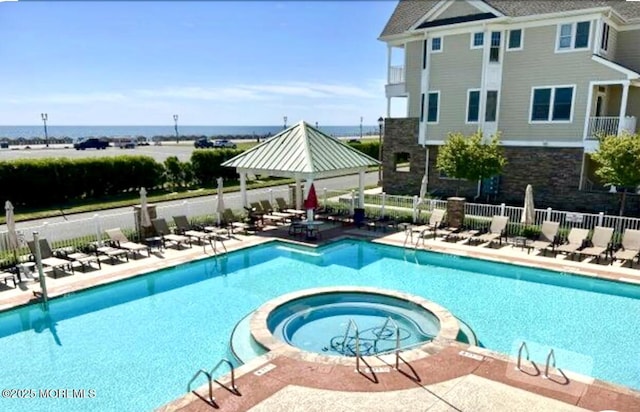 33 Cooper Ave Unit 401, Long Branch, NJ 07740 - view of swimming pool with a pool with connected hot tub, a patio, and a gazebo