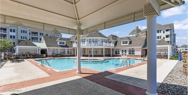 33 Cooper Ave Unit 401, Long Branch, NJ 07740 - community pool featuring a residential view, a patio, a hot tub, and french doors