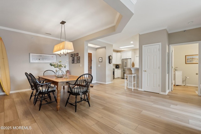 33 Cooper Ave Unit 401, Long Branch, NJ 07740 - dining space with light wood finished floors, crown molding, a chandelier, and baseboards