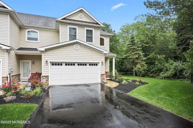 115 Hedgerow Ln, Manalapan, NJ 07726 - view of front of property featuring an attached garage, asphalt driveway, stone siding, and a front lawn