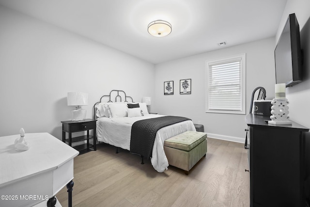 115 Hedgerow Ln, Manalapan, NJ 07726 - bedroom with light wood-type flooring and baseboards