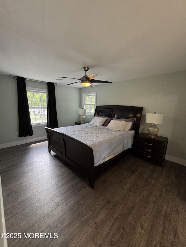 63 1st St, Barnegat, NJ 08005 - bedroom featuring dark wood finished floors, baseboards, and a ceiling fan