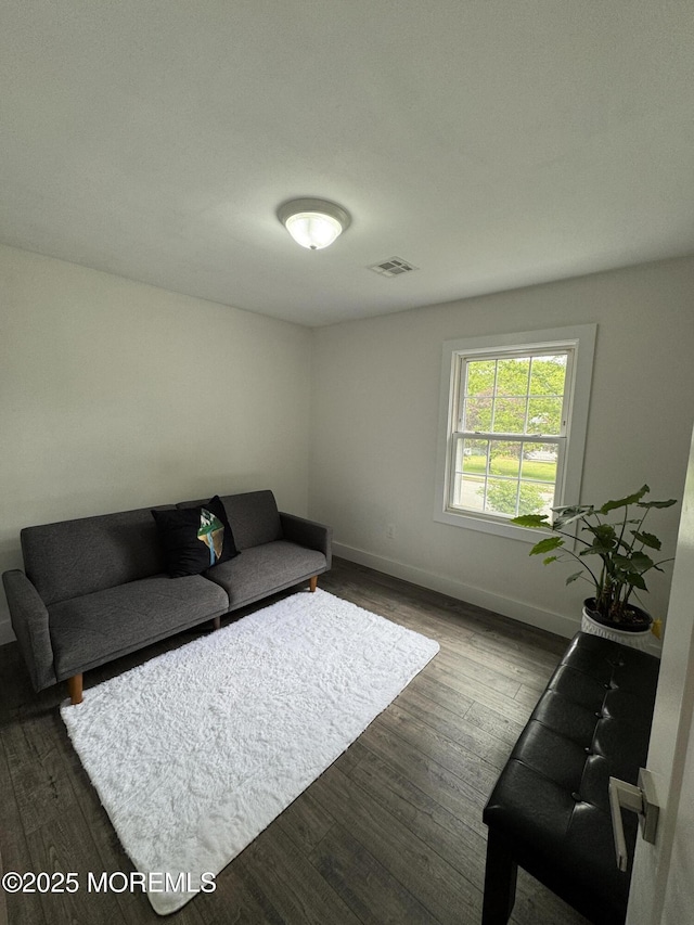 63 1st St, Barnegat, NJ 08005 - living room with baseboards and dark wood finished floors
