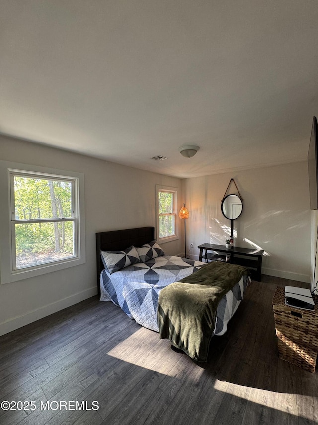 63 1st St, Barnegat, NJ 08005 - bedroom with wood finished floors and baseboards