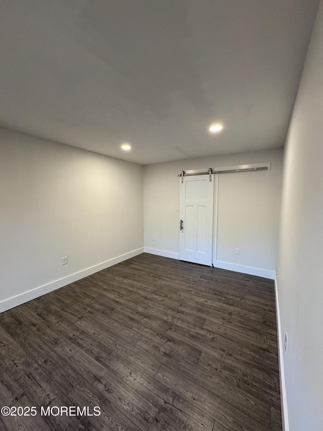 63 1st St, Barnegat, NJ 08005 - empty room featuring dark wood-style flooring, recessed lighting, and baseboards