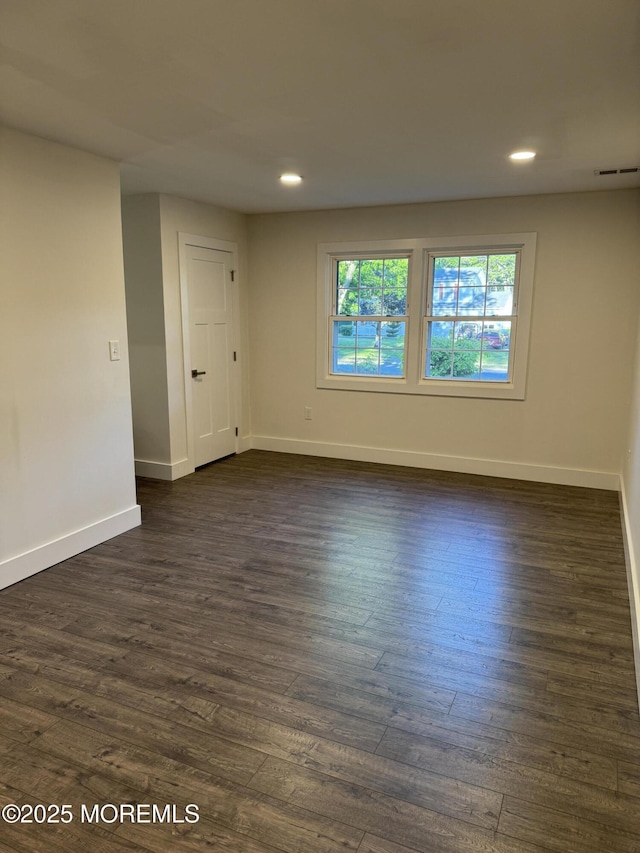 63 1st St, Barnegat, NJ 08005 - empty room featuring dark wood-type flooring, baseboards, and recessed lighting
