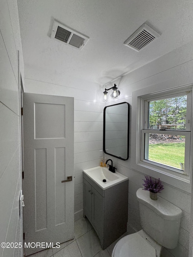 63 1st St, Barnegat, NJ 08005 - bathroom featuring toilet and vanity