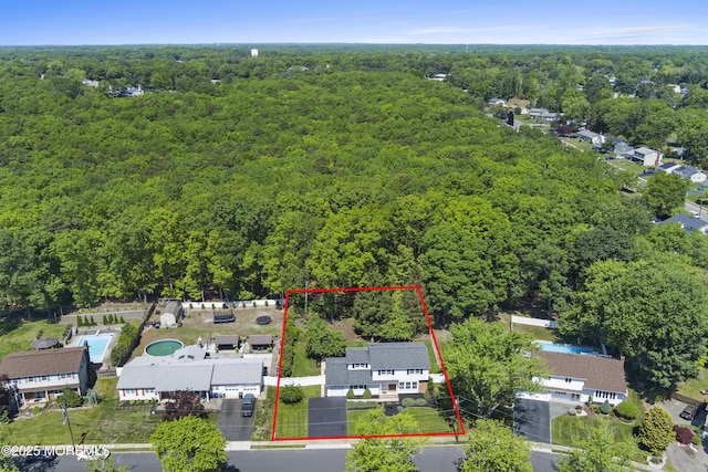 10 Pepperidge Rd, Howell, NJ 07731 - aerial view of property and surrounding area with a heavily wooded area and property parcel outlined