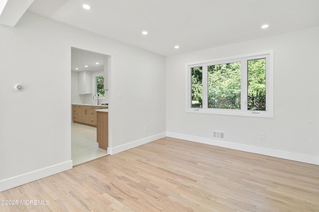 10 Pepperidge Rd, Howell, NJ 07731 - unfurnished room featuring light wood-style flooring, a sink, recessed lighting, and baseboards