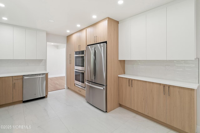 10 Pepperidge Rd, Howell, NJ 07731 - kitchen with stainless steel appliances, recessed lighting, decorative backsplash, light countertops, and light marble finish floors