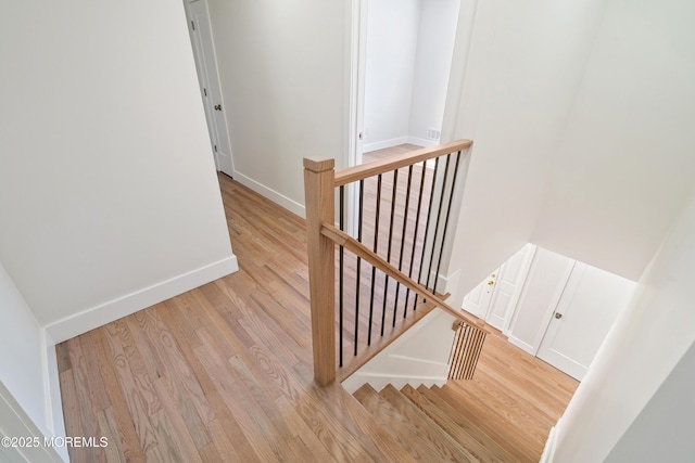 10 Pepperidge Rd, Howell, NJ 07731 - staircase with wood finished floors and baseboards